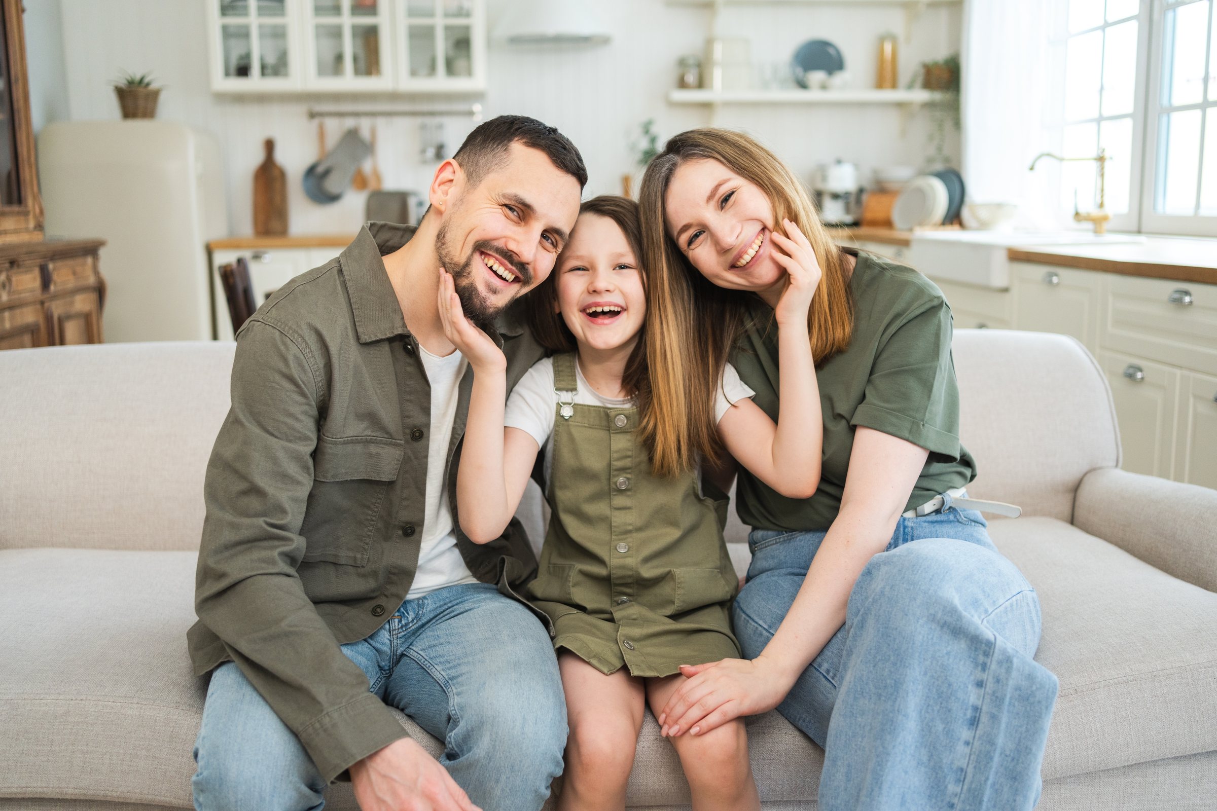 Smiling family enjoying time together at home